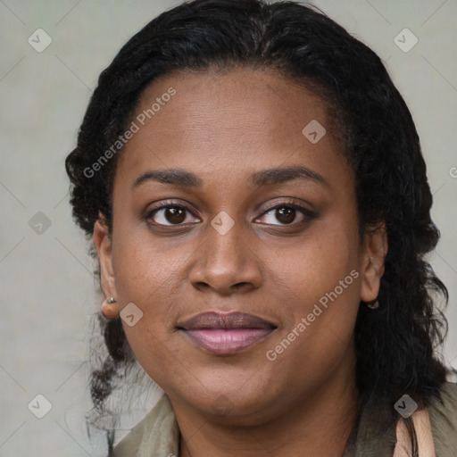 Joyful black young-adult female with medium  brown hair and brown eyes