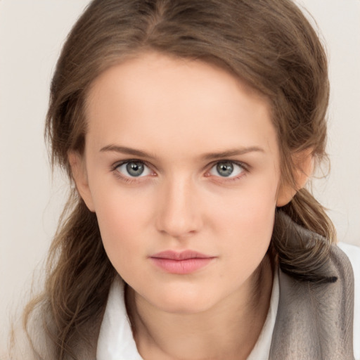 Neutral white young-adult female with medium  brown hair and brown eyes