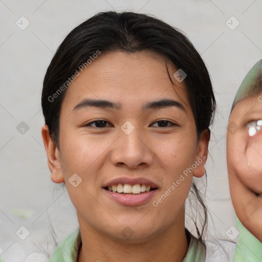 Joyful asian young-adult female with short  brown hair and brown eyes