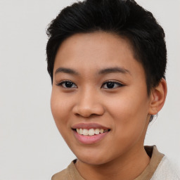 Joyful asian young-adult female with short  black hair and brown eyes