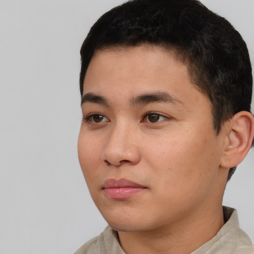 Neutral white young-adult male with short  black hair and brown eyes