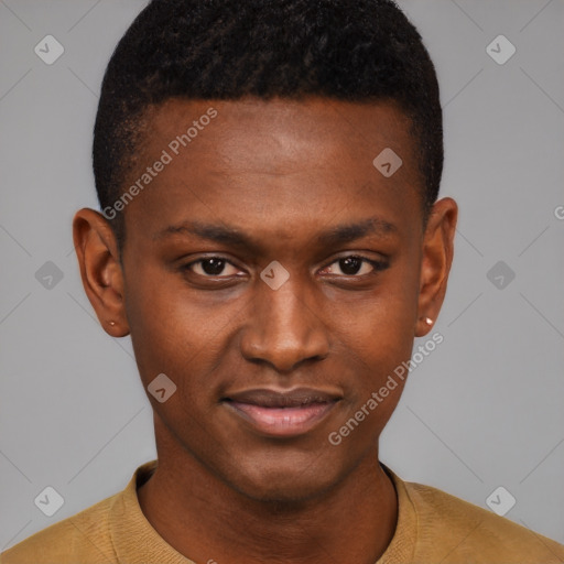 Joyful black young-adult male with short  brown hair and brown eyes
