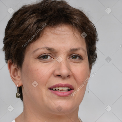 Joyful white adult female with short  brown hair and grey eyes