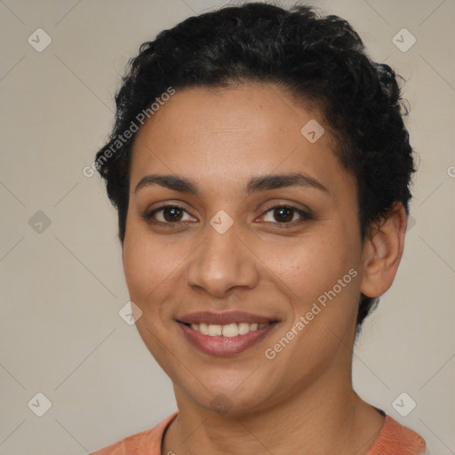 Joyful latino young-adult female with short  brown hair and brown eyes