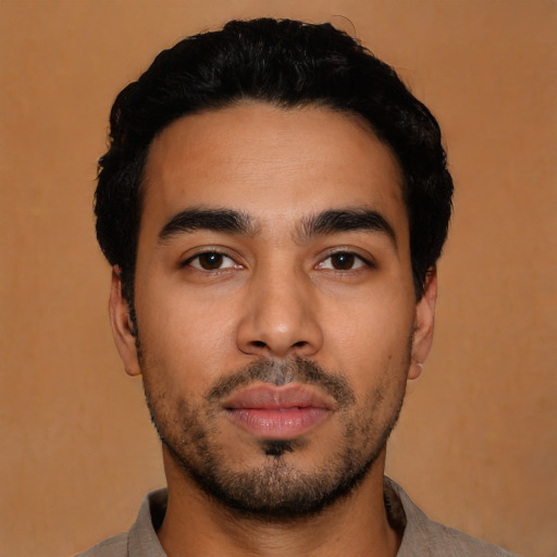 Neutral latino young-adult male with short  black hair and brown eyes