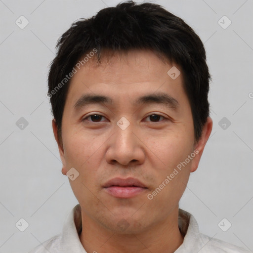 Neutral asian young-adult male with short  brown hair and brown eyes