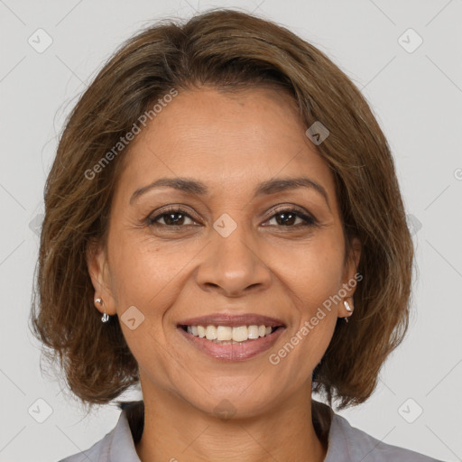 Joyful white adult female with medium  brown hair and brown eyes