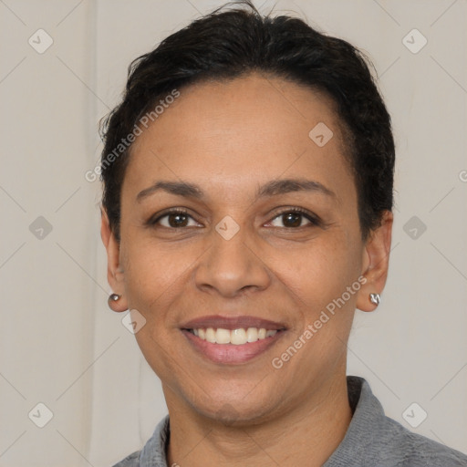 Joyful white adult female with short  brown hair and brown eyes