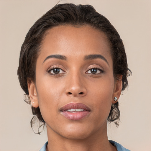 Joyful white young-adult female with medium  brown hair and brown eyes