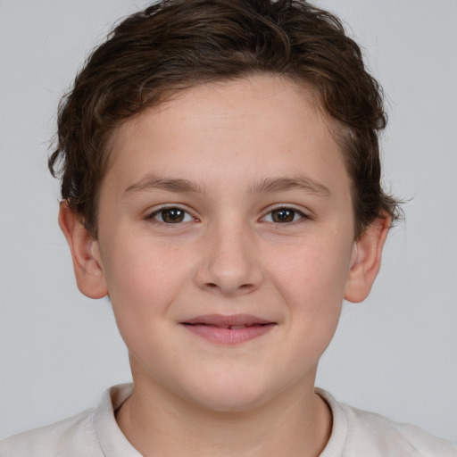 Joyful white child female with short  brown hair and brown eyes