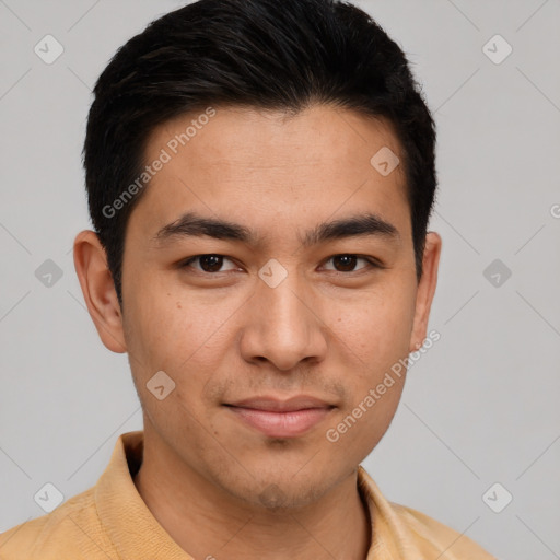 Joyful asian young-adult male with short  brown hair and brown eyes