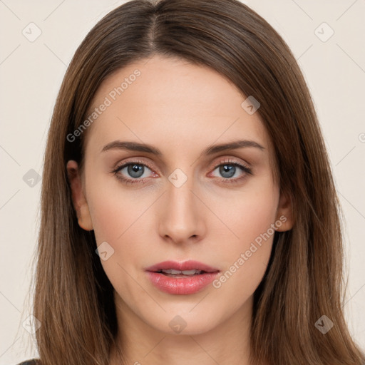 Neutral white young-adult female with long  brown hair and brown eyes