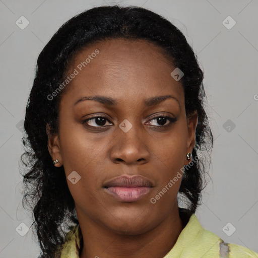 Neutral black young-adult female with medium  brown hair and brown eyes