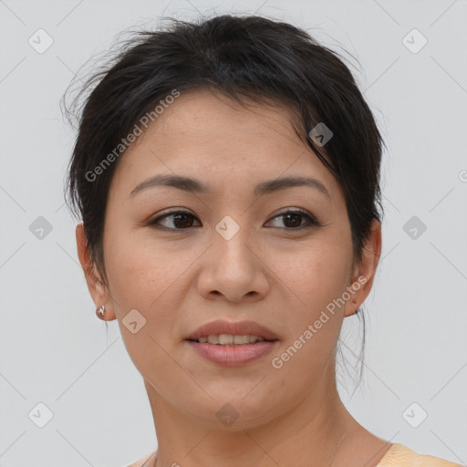 Joyful asian young-adult female with short  brown hair and brown eyes