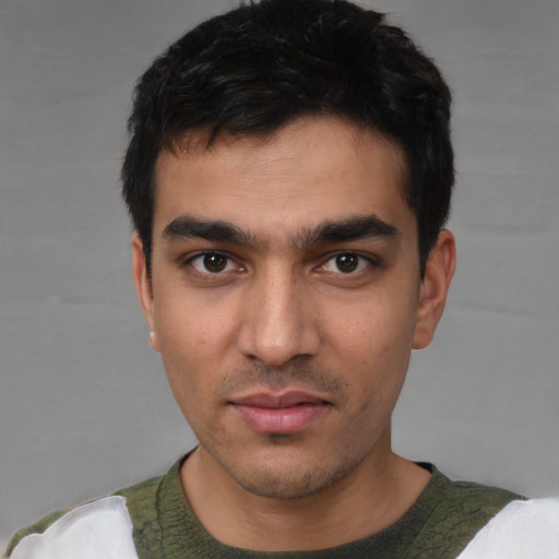 Neutral white young-adult male with short  black hair and brown eyes