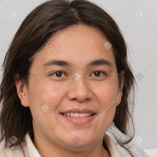 Joyful white adult female with medium  brown hair and brown eyes