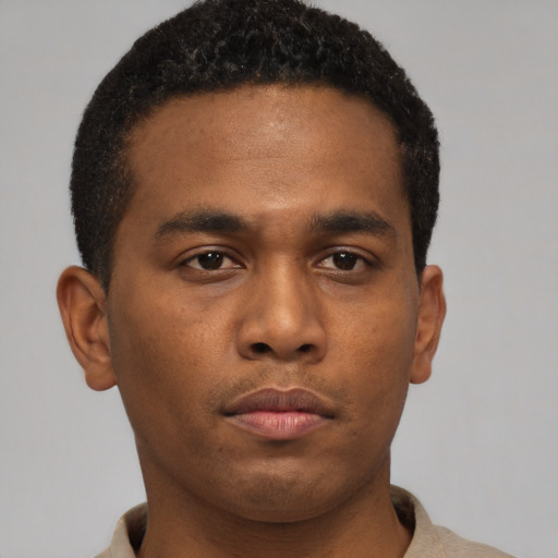 Neutral black young-adult male with short  brown hair and brown eyes