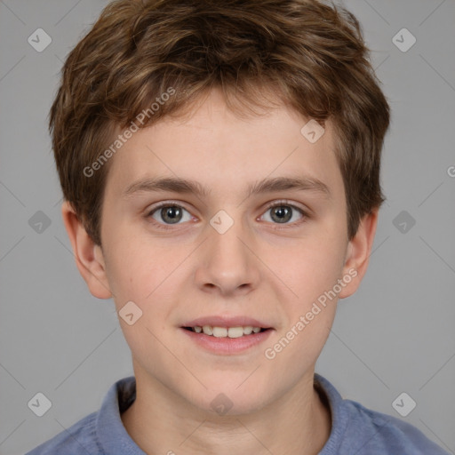 Joyful white child male with short  brown hair and brown eyes