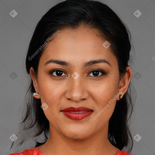 Joyful latino young-adult female with medium  brown hair and brown eyes