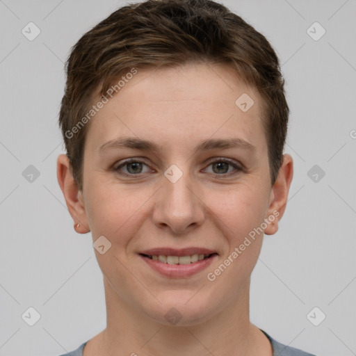 Joyful white young-adult female with short  brown hair and grey eyes