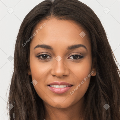 Joyful latino young-adult female with long  brown hair and brown eyes