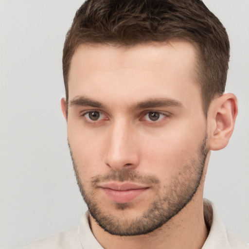 Neutral white young-adult male with short  brown hair and brown eyes