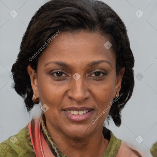 Joyful black adult female with short  brown hair and brown eyes