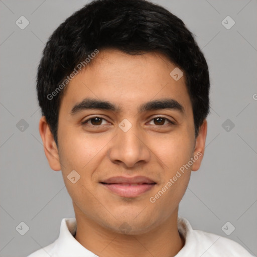 Joyful latino young-adult male with short  brown hair and brown eyes