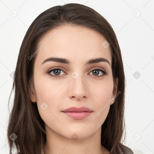 Neutral white young-adult female with long  brown hair and brown eyes