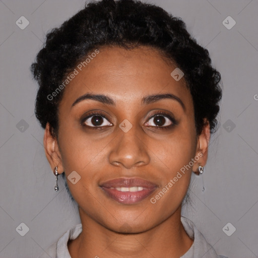 Joyful black young-adult female with short  brown hair and brown eyes