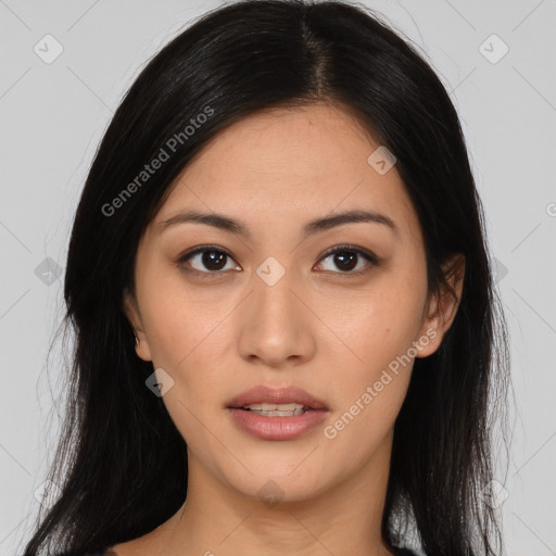 Joyful asian young-adult female with long  brown hair and brown eyes