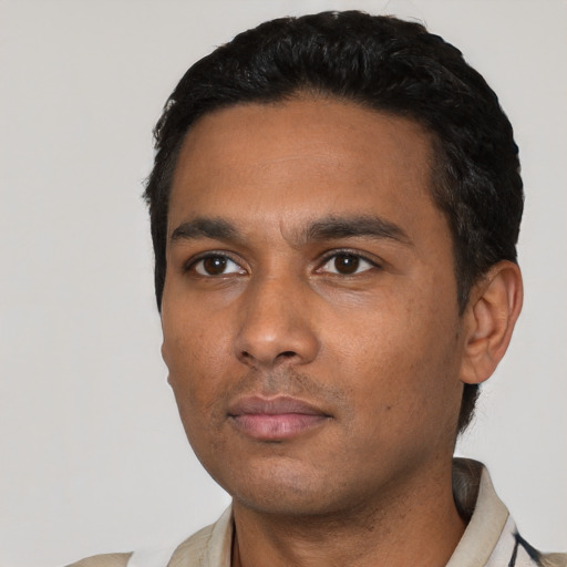 Neutral latino young-adult male with short  black hair and brown eyes