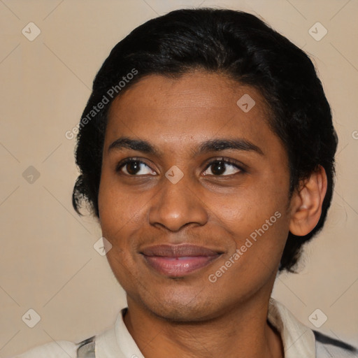 Joyful latino young-adult female with short  black hair and brown eyes