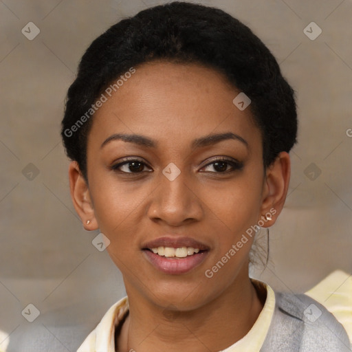 Joyful black young-adult female with short  black hair and brown eyes