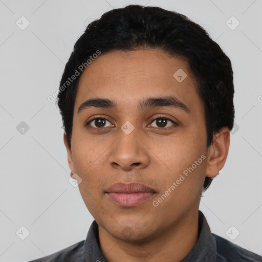 Neutral latino young-adult male with short  black hair and brown eyes