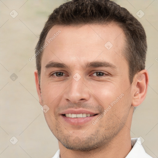 Joyful white young-adult male with short  brown hair and brown eyes