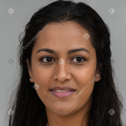 Joyful latino young-adult female with long  brown hair and brown eyes