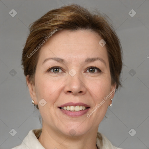 Joyful white adult female with short  brown hair and grey eyes