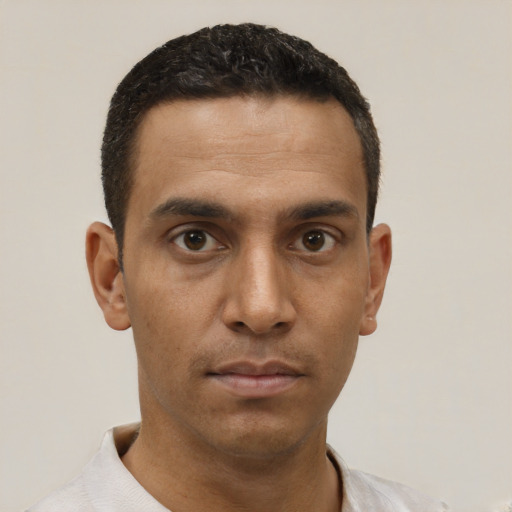 Neutral white young-adult male with short  black hair and brown eyes