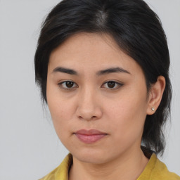 Neutral asian young-adult female with medium  brown hair and brown eyes