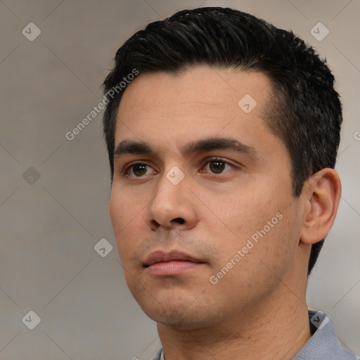 Neutral white young-adult male with short  black hair and brown eyes