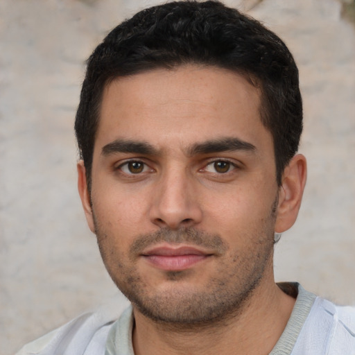 Neutral white young-adult male with short  brown hair and brown eyes