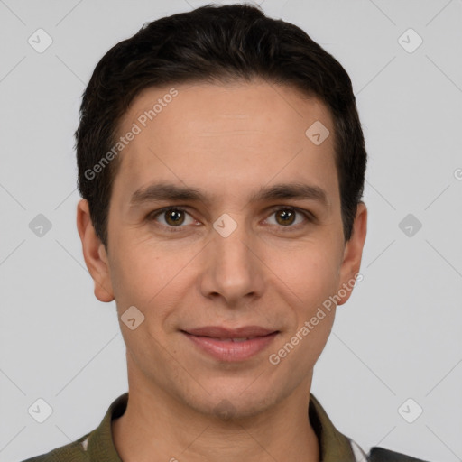 Joyful white young-adult male with short  brown hair and grey eyes