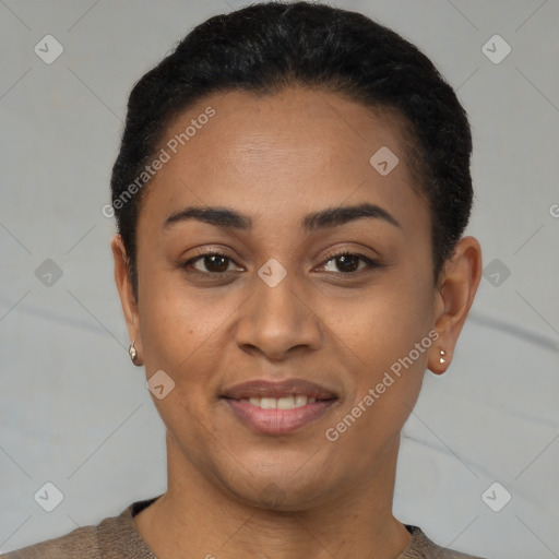Joyful latino young-adult female with short  black hair and brown eyes