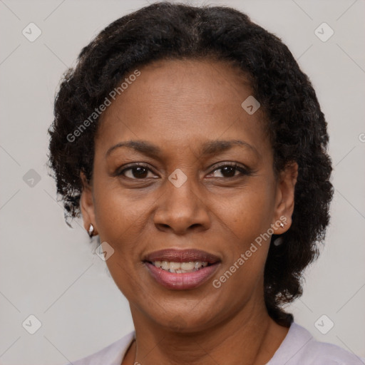 Joyful latino adult female with short  brown hair and brown eyes