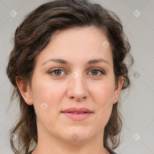 Joyful white young-adult female with medium  brown hair and green eyes