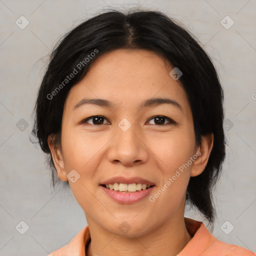 Joyful asian young-adult female with medium  black hair and brown eyes