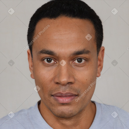 Neutral latino young-adult male with short  black hair and brown eyes