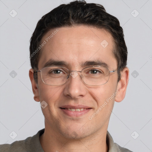 Joyful white adult male with short  brown hair and grey eyes