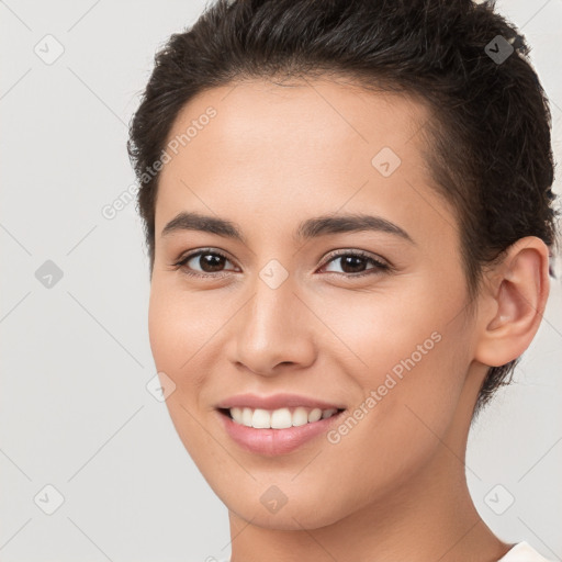 Joyful white young-adult female with short  brown hair and brown eyes